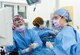 A joint surgical team comprised of three separate branches assembled to perform an operation at U.S. Air Force Hospital Langley at Joint Base Langley-Eustis, Virginia, Dec. 11, 2018.