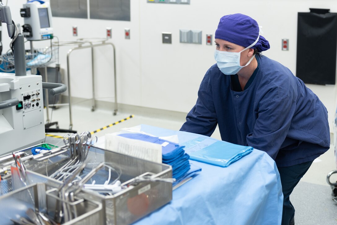 U.S. Air Force Maj. Mandy Giffin, Surgical Operations Squadron operating room nurse, prepares the OR for surgery at Joint Base Langley-Eustis, Virginia, Dec. 11, 2018.