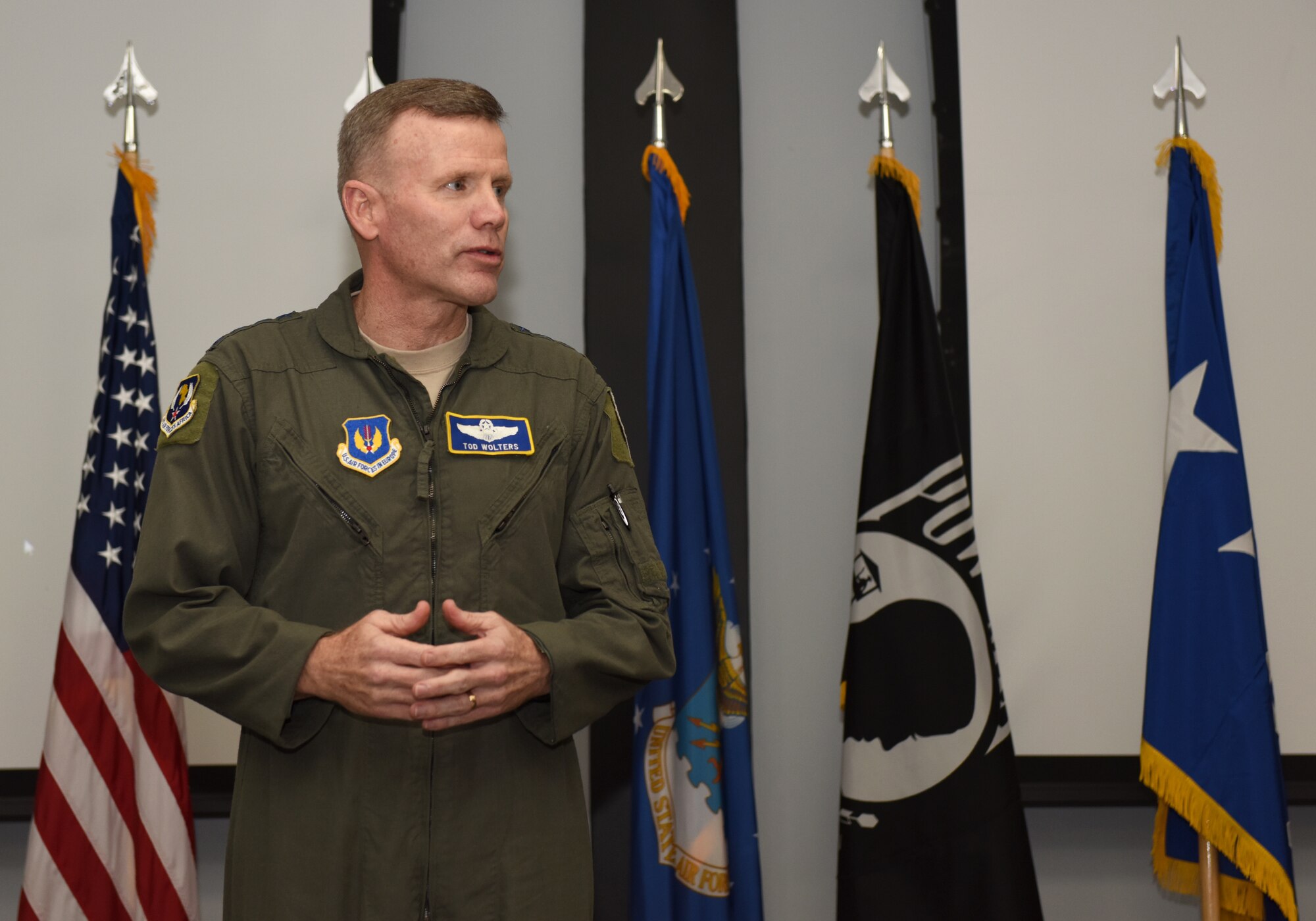 U.S. Air Force Gen. Tod D. Wolters, United States Air Forces in Europe – Air Forces Africa commander, speaks to Airman and guests during the presentation of the Lt. Col. Anthony C. Shine Fighter Pilot Award at Royal Air Force Lakenheath, Dec. 11, 2018. U.S. Air Force Maj. Eric Joachim, 48th Operations Support Squadron chief of weapons, earned the prestigious award through his exceptional flying abilities, superior leadership and dedicated community involvement. (U.S. Air Force photo by Staff Sgt. Alex Echols)