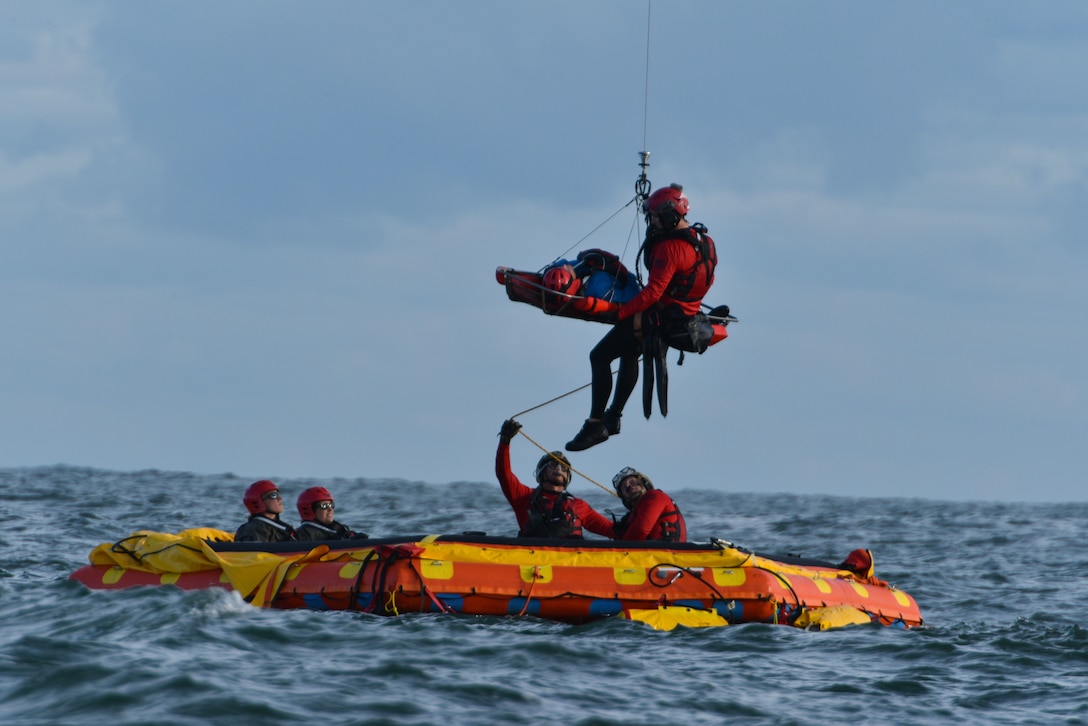 Personnel from the 45th Operations Group simulate astronaut rescue and recovery operations