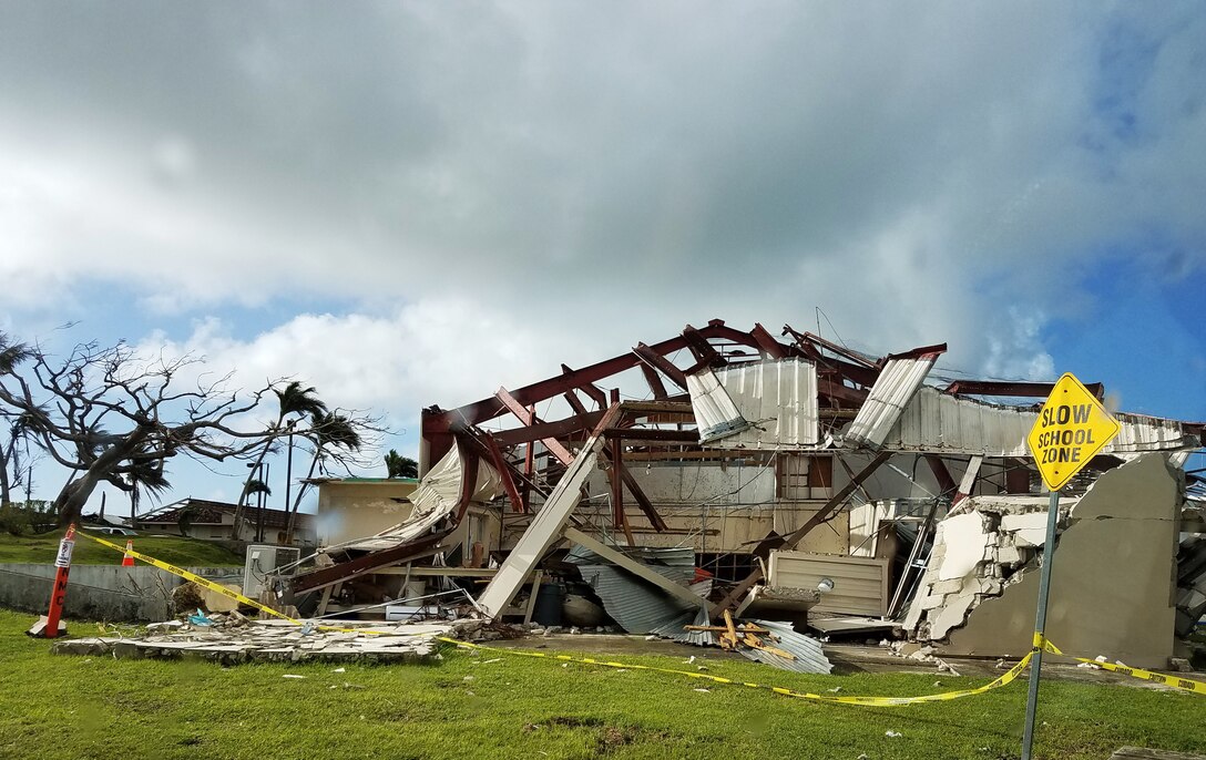 A school building on the Island of Taipan in the Northern Mariana Islands sustained severe damage from Super Typhoon Yutu in fall 2018. Personnel from the New York District have deployed to the area building 66 temporary classrooms for students displaced from Hopwood Middle School and Northern Marianas College. (Photo: Jason Shea, Project Manager).