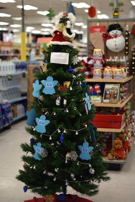 Angels listing different amounts of donations available hang from the Project Angel Tree, a First Sergeant’s Council sponsored event, at the Base Exchange on Goodfellow Air Force Base, Texas, Dec. 18, 2018. The money that is raised through Angel Tree is given to children of Goodfellow families who need extra help and support. (U.S. Air Force photo by Airman 1st Class Zachary Chapman/Released)