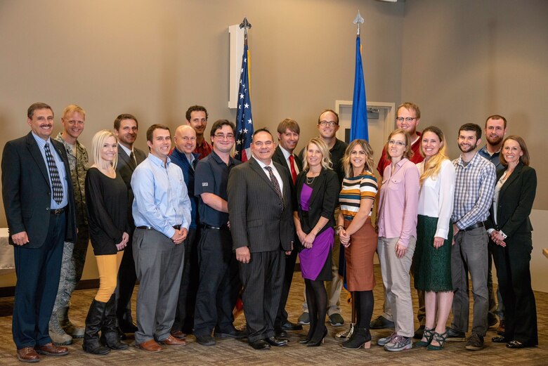 Air Force Nuclear Weapons Center interns participate in a graduation ceremony Nov. 1, 2018, at the AFNWC’s ICBM Systems Directorate located at Hill Air Force Base, Utah. From left in front row are Kerry Sparks, Kira Valentine, Justin Weight, Phillip Ingraham, Dave Stacey, Shannon Clugston, Mykenzie Hamblin, Sariah Cassidy, Kelly Squires, Eric Salas and Amber Hampton. In back from left are Col. Luke Cropsey, Alex Nebeker, Michael Sabin, Jacob Jackson, Page Wiberg, Jay Lindstrom, Jonathan Tayler and Hayden Christensen. (Courtesy photo)