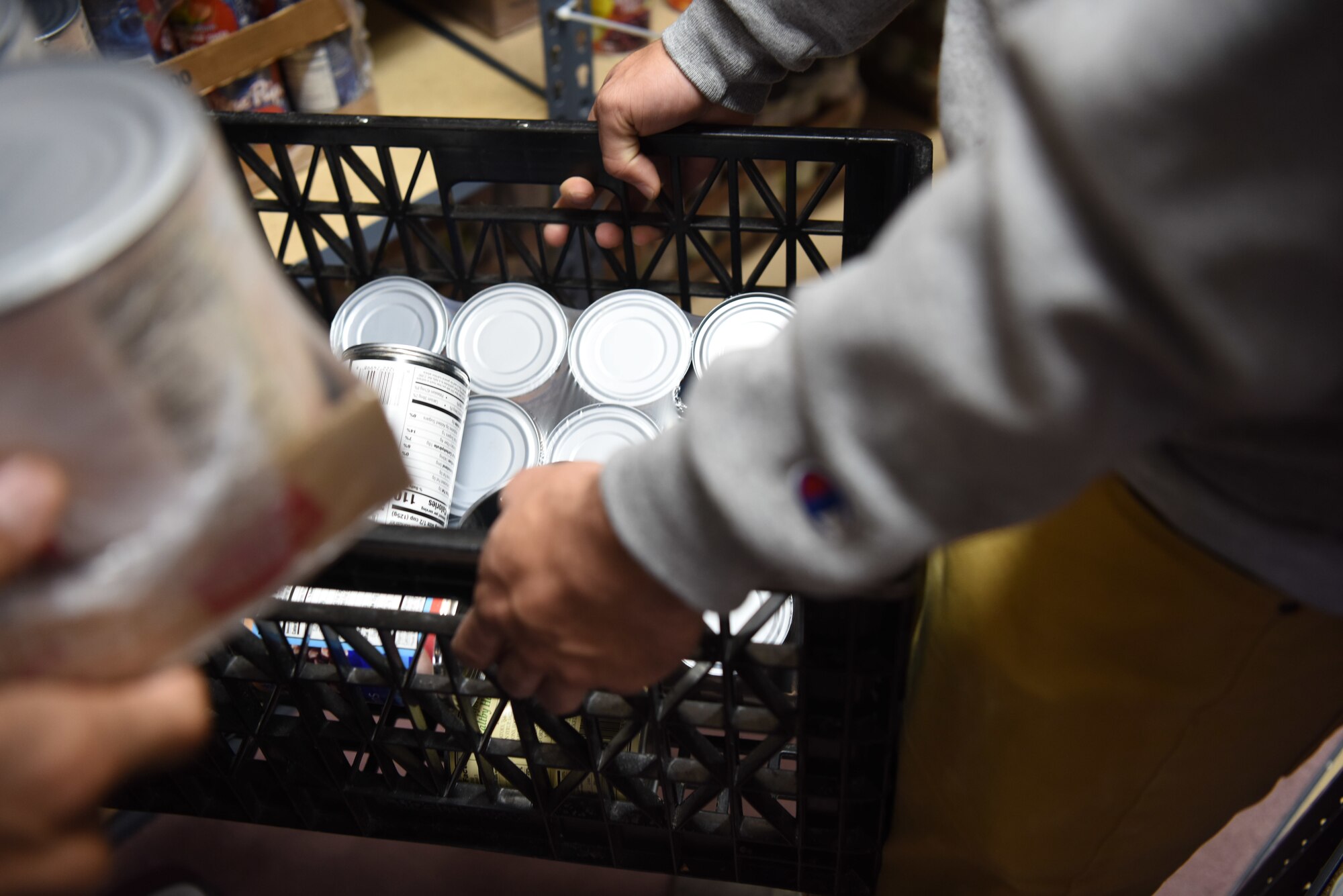 Fourteen Airmen from the 381st Training Group volunteer at The Good Samaritan Bridgehouse Shelter in Lompoc, Calif. Dec. 20, 2018. With the help of Capt. Douglas Dixon, 30th Space Wing chaplain, the 381st Training Group white rope Airmen lead a monthly volunteer event feeding homeless at the shelter.