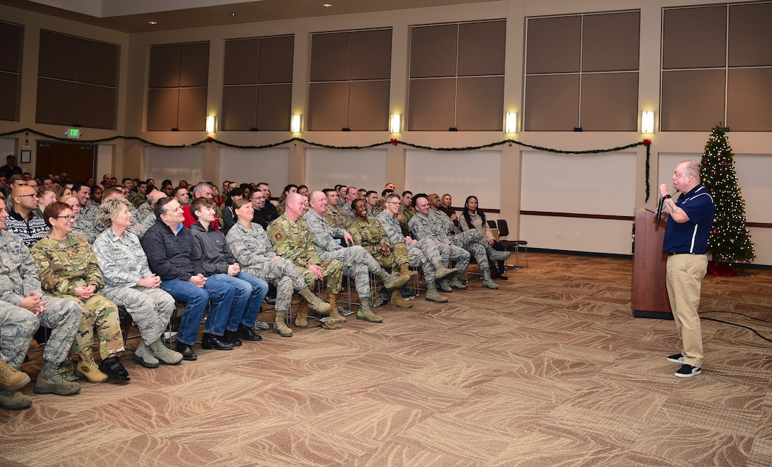 Senior Master Sgt. Israel Del Toro, 98th Flying Training Squadron accelerated freefall training program superintendent, shares his story of overcoming adversity with members of Team Buckley, Dec. 20, 2018, at Buckley Air Force Base, Colo. Del Toro was injured in Afghanistan, Dec. 4, 2005, and became the first 100 percent disabled Airman to reenlist in the Air Force on Feb. 8, 2010. (U.S. Air Force photo by Airman 1st Class Michael D. Mathews)