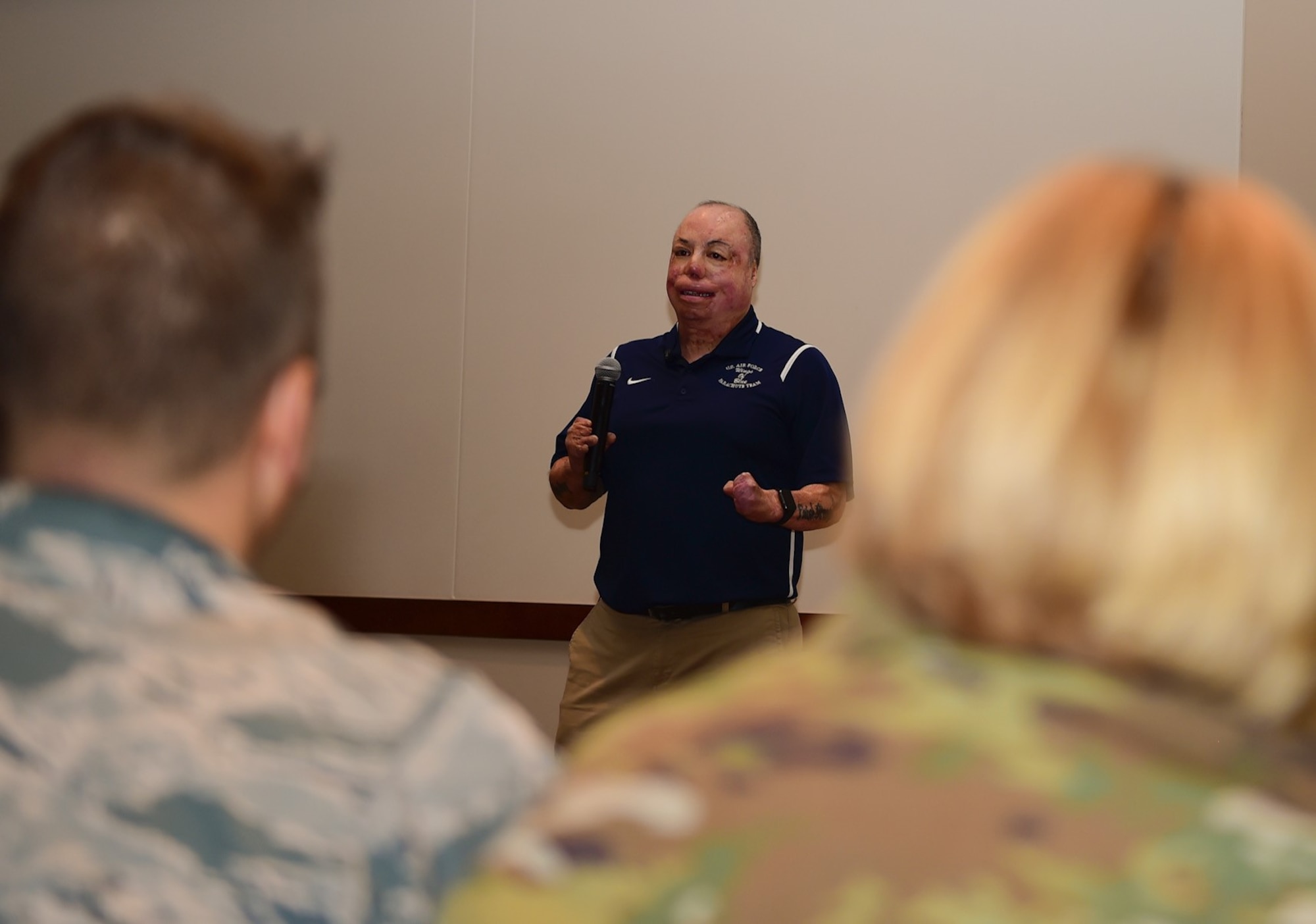 Senior Master Sgt. Israel Del Toro, 98th Flying Training Squadron accelerated freefall training program superintendent, shares his story of overcoming adversity with members of Team Buckley, Dec. 20, 2018, at Buckley Air Force Base, Colo. Del Toro was injured in Afghanistan, Dec. 4, 2005, and became the first 100 percent disabled Airman to reenlist in the Air Force on Feb. 8, 2010. (U.S. Air Force photo by Airman 1st Class Michael D. Mathews)