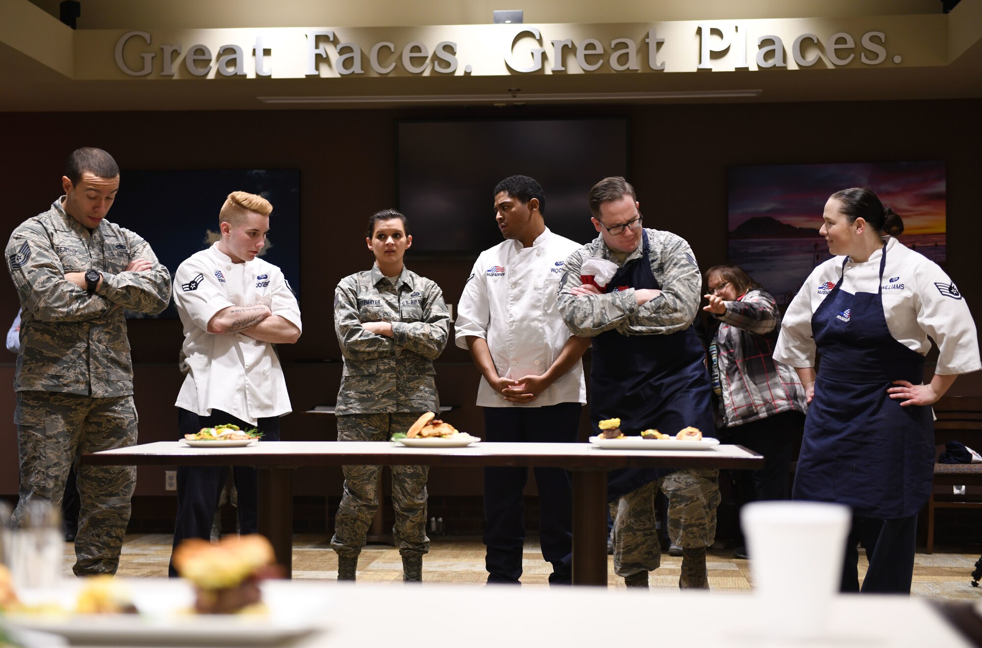 Contestants wait for the judges to vote on their plates at the Chef of the Quarter cook-off competition at the Raider Café on Ellsworth Air Force Base, S.D., Dec. 18, 2018. Each team created a plate that went along with the brunch theme and incorporated two secret ingredients: fennel and avocado. The plates were judged by taste, presentation, creativity and originality. (U.S. Air Force photo by Airman 1st Class Christina Bennett)