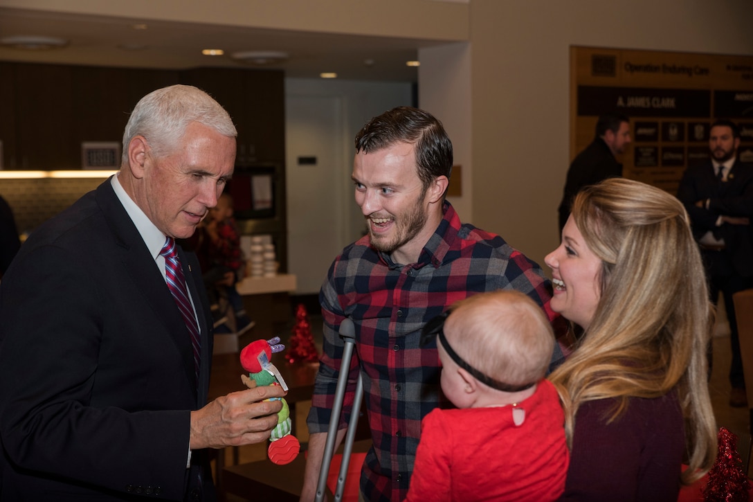 Vice President Mike Pence shares a moment at the USO Warrior and Family Center.