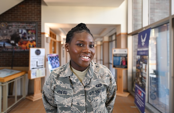 Senior Airman Bernice Asiedu, a 28th Comptroller Squadron customer service technician, stands in the Rushmore Building on Ellsworth Air Force Base, S.D., Dec. 20, 2018. Asiedu, originally from Ghana, came to the U.S. via the Electronic Diversity Lottery.  In the year she was selected, more than 14 million people applied. Asiedu had less than a 1 percent chance of being selected. (U.S. Air Force photo by Airman 1st Class Thomas Karol)