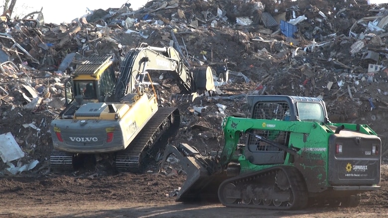 Workers move debris on Tyndall AFB, Florida. The base was hit by Hurricane Michael a Category 4 storm on October 10.