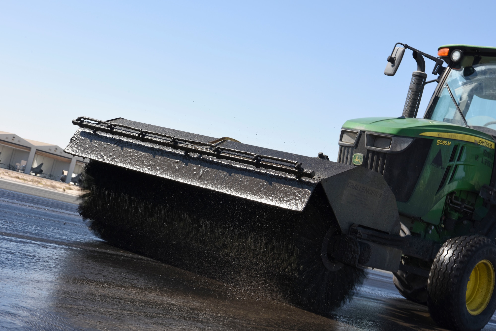 The 577th Expeditionary Prime Beef Squadron uses machines to agitate Avion during the rubber removal process Al Dhafra Air Base, United Arab.