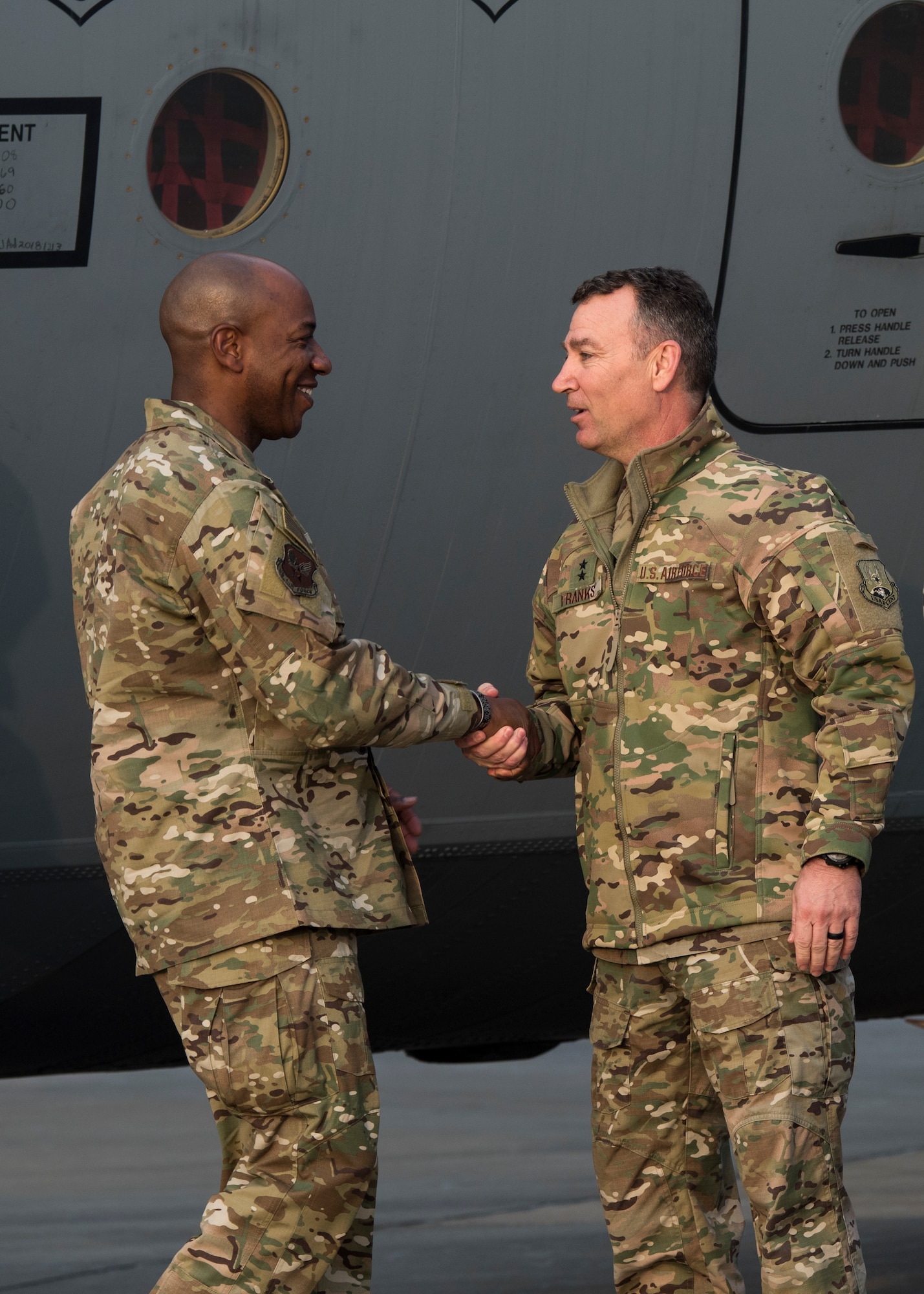 Chief Master Sgt. of the Air Force Kaleth O. Wright shakes hands with Maj. Gen. Chad Franks, the Deputy Commander, Operations and Intelligence, Combined Joint Task Force-Operation Inherent Resolve, after arriving at an undisclosed location in Southwest Asia, Dec. 20, 2018. Service members of different branches were given the opportunity to welcome and meet Wright during his visit. (U.S. Air Force photo by Staff Sgt. Jeremy L. Mosier)