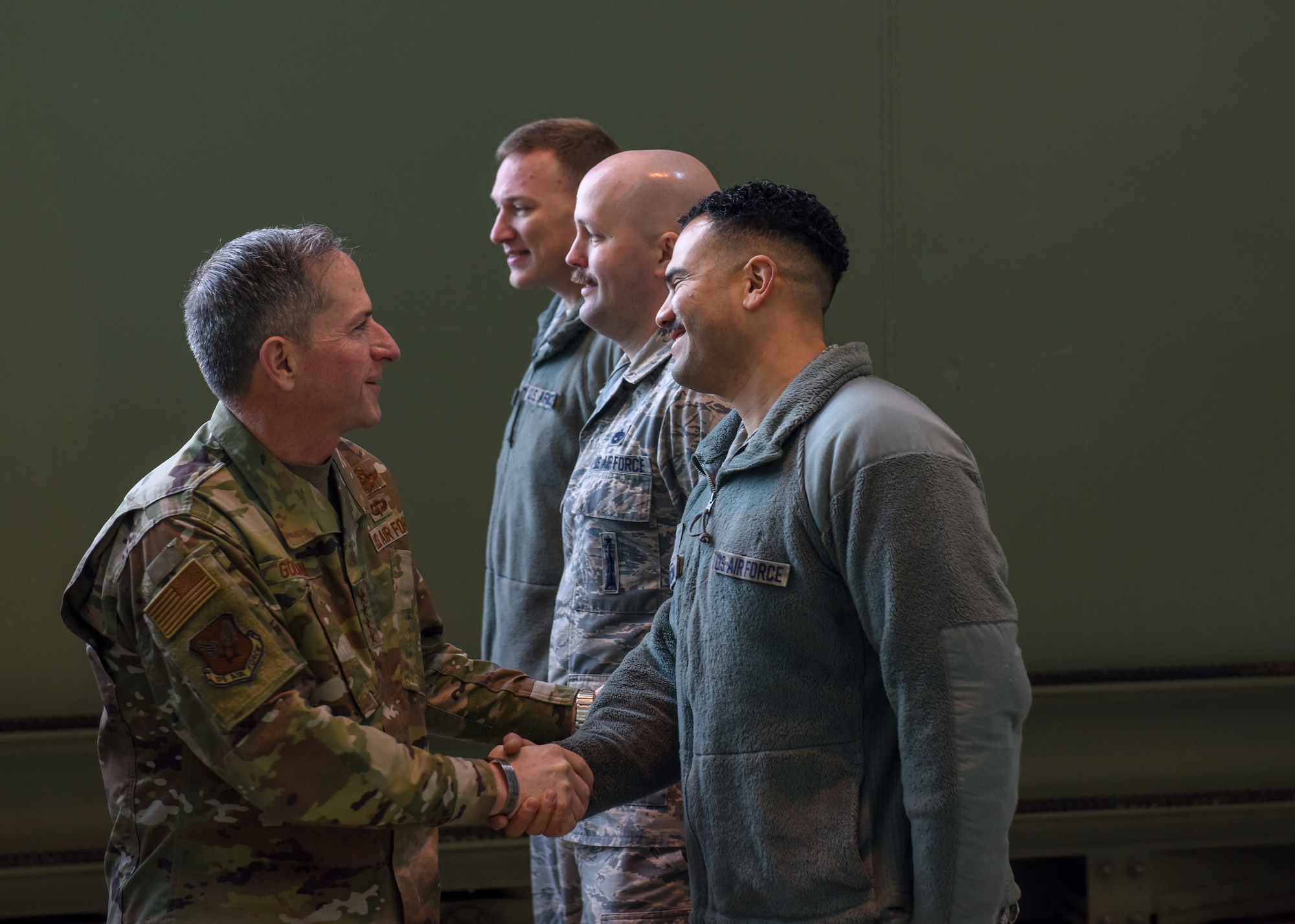 Air Force Chief of Staff shakes hands with Security Forces Airmen.