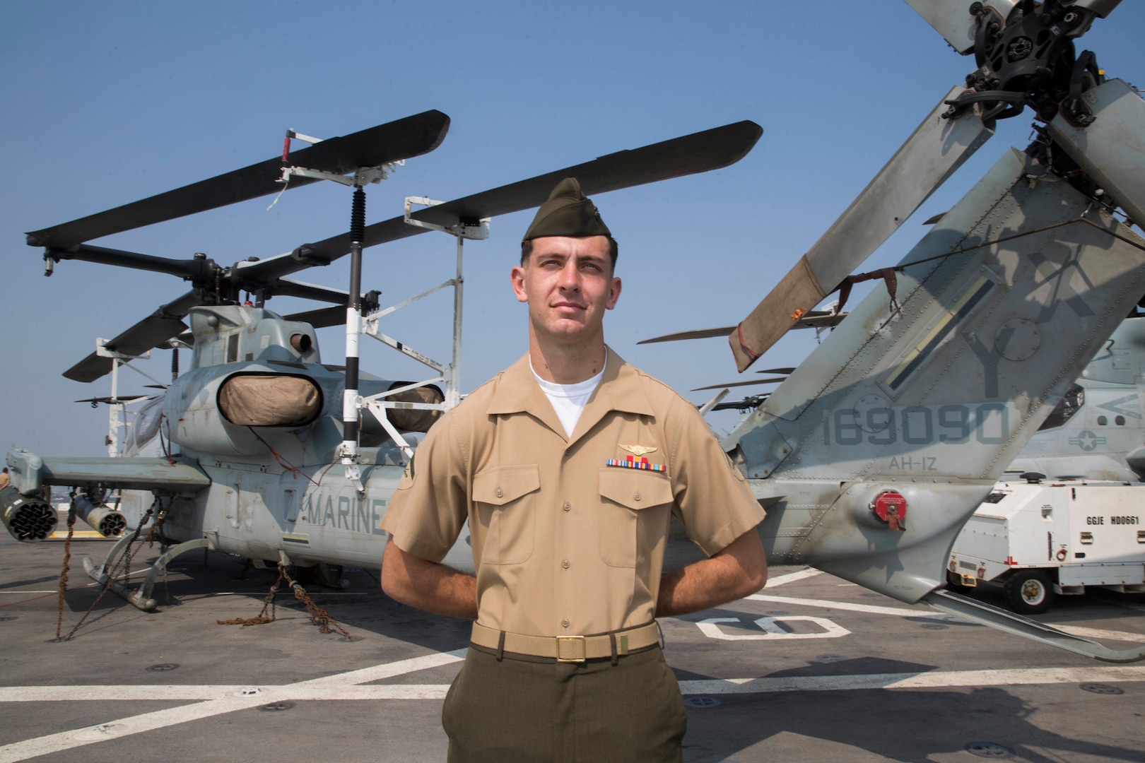 U.S. Marine Lance Cpl. Conner Krecklow, a UH-1Y Venom crew chief with Marine Medium Tiltrotor Squadron 166 (Reinforced), 13th Marine Expeditionary Unit (MEU), mans the rails aboard the San Antonio-class amphibious transport dock USS Anchorage (LPD 23), Dec.  22, 2018. The Anchorage, assigned to the Essex Amphibious Ready Group (ARG), is conducting a partnership strengthening visit to Visakhapatnam, India.  The Essex ARG and 13th MEU are a capable and lethal Navy-Marine Corps team deployed to the U.S. 7th Fleet area of operations to support regional stability, reassure partners and allies and maintain a presence postured to respond to any crisis ranging from humanitarian assistance to contingency operations.