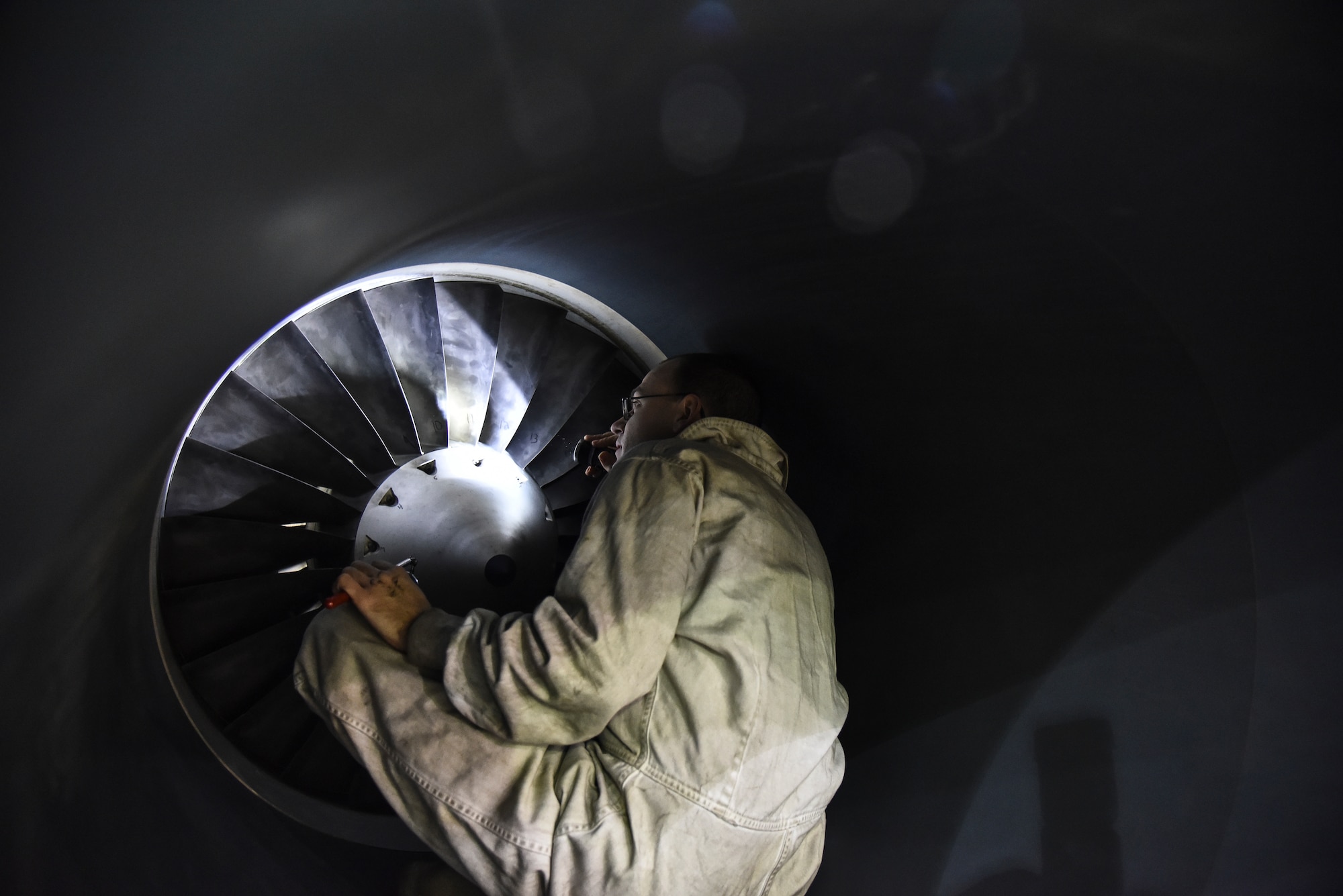 U.S. Air Force Staff Sgt. Jeremiah Fuhrmann, 380th Expeditionary Aircraft Maintenance Squadron RQ-4 Global Hawk crew chief, conducts a pre-flight inspection on an RQ-4 at Al Dhafra Air Base, United Arab Emirates, Dec. 20, 2018. The crew chief’s extensive list of responsibilities including for pre-, post- and thru-flight checks, and well as various inspections, allows them to fully understand their vital role, making them jacks-of-all-trades when it comes to repairing the aircraft. (U.S. Air Force photo by Senior Airman Mya M. Crosby)