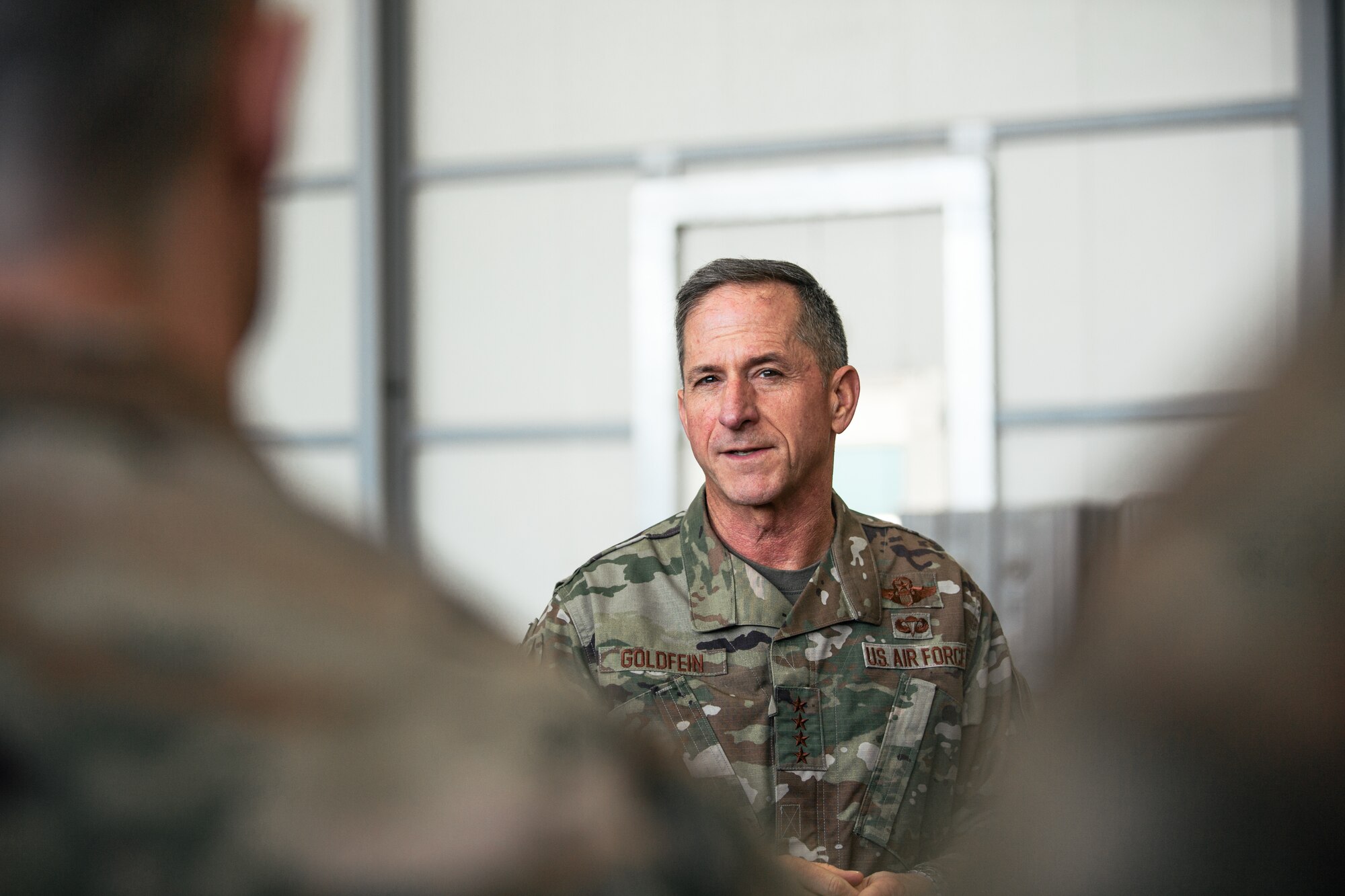 Air Force Chief of Staff Gen. David L. Goldfein thanks deployed Airmen for their service at an undisclosed location in Southwest Asia, Dec. 22, 2018. Goldfein, Chief Master Sgt. of the Air Force Kaleth O. Wright, and U.S. Air Forces Central Command commander Lt. Gen. Joseph Guastella traveled throughout U.S. Central Command's area of responsibility thanking Airmen for their sacrifice, recognizing outstanding performers and listening to Airmen during the holiday season. (U.S. Air Force photo by Staff Sgt. Jordan Castelan)