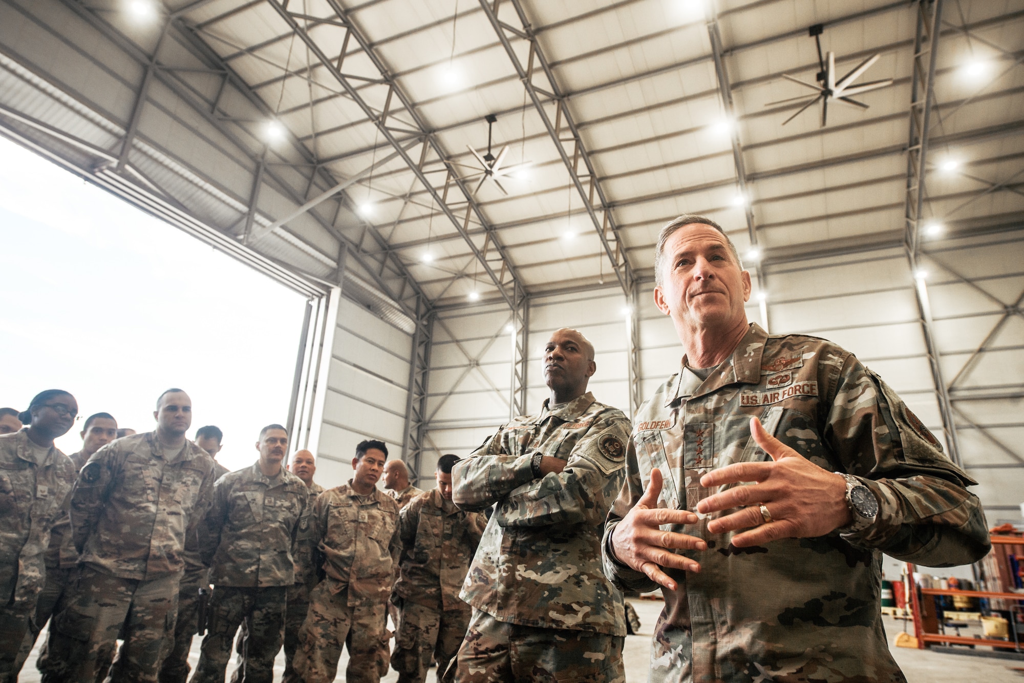 Air Force Chief of Staff Gen. David L. Goldfein and Chief Master Sgt. of the Air Force Kaleth O. Wright talk with deployed Airmen at an undisclosed location in Southwest Asia, Dec. 22, 2018. Goldfein and Wright, “The Chiefs Team,” visited Airmen throughout U.S. Central Command’s area of responsibility to offer guidance, thanks, and listen to Airmen. (U.S. Air Force photo by Staff Sgt. Jordan Castelan)