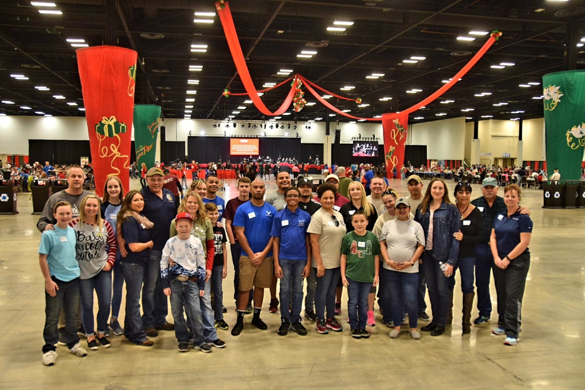 Reserve Citizen Airmen from the 433rd Airlift Wing joined forces with 1,000 other volunteers from the Greater San Antonio Area in serving more than 10,000 meals during the afternoon shift at H-E-B’s 26th Annual Feast of Sharing holiday dinner Dec. 23 at the Henry B. Gonzalez Convention Center in San Antonio, Texas.