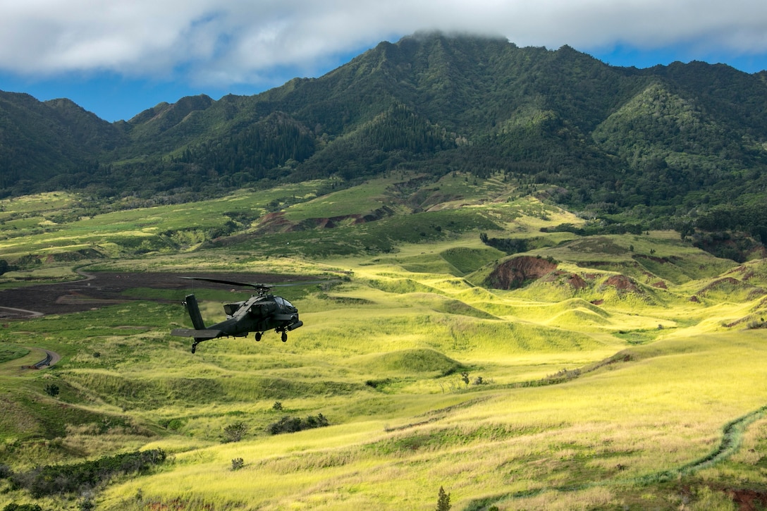 A helicopter flies over Schofield Barracks.