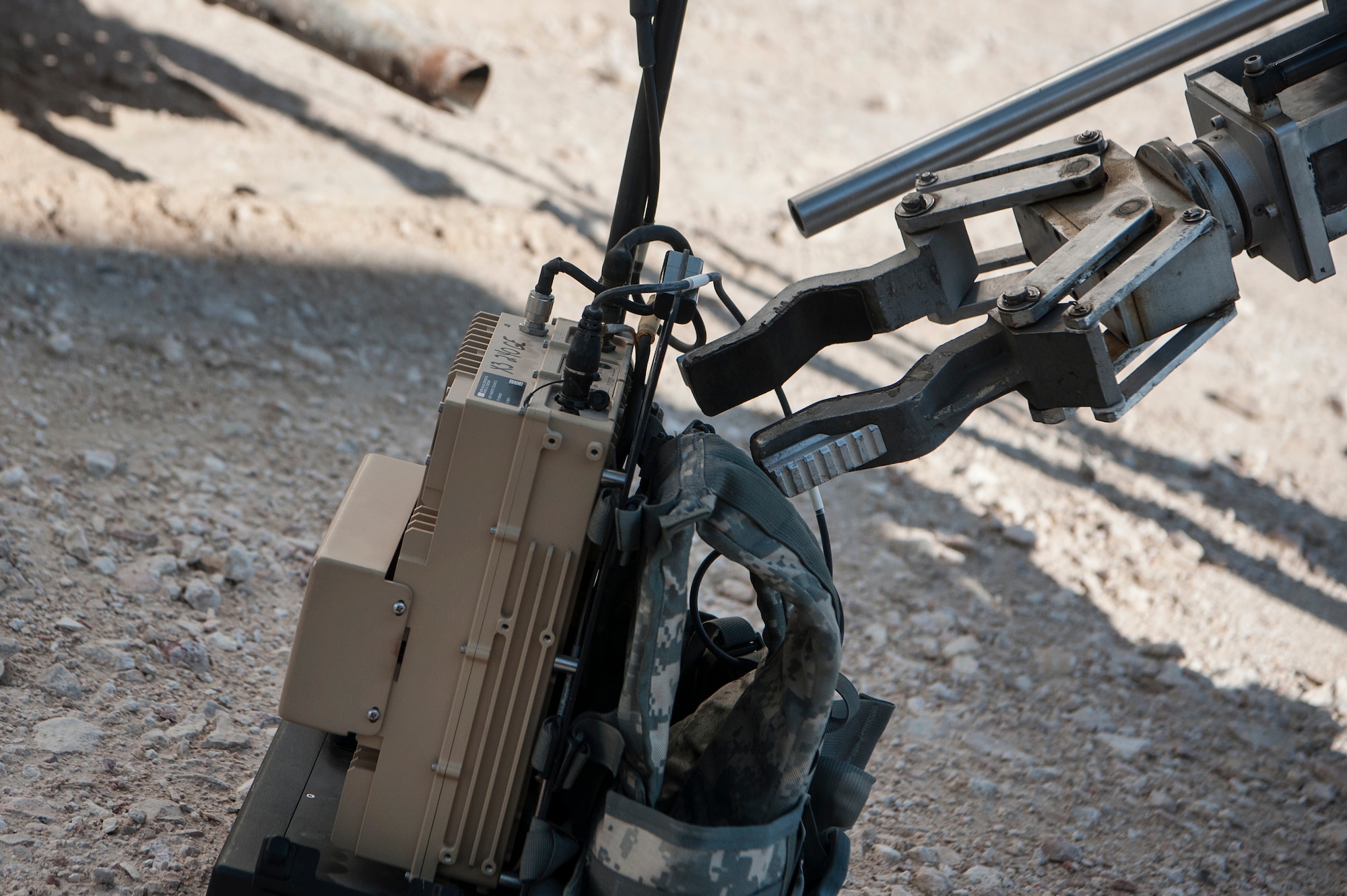 The 379th Expeditionary Civil Engineer Squadron explosive, ordnance, and disposal (EOD) team’s remotely controlled F6A Robotic Platform moves near a simulated vehicle borne improvised explosive device (VBIED) during a VBIED training exercise Dec. 18, 2018, at Al Udeid Air Base, Qatar. Training participants utilized an F6A robotic platform, the bomb suit, and other specific tools to disrupt a VBIED during the exercise. (U.S. Air Force photo by Tech. Sgt. Christopher Hubenthal)
