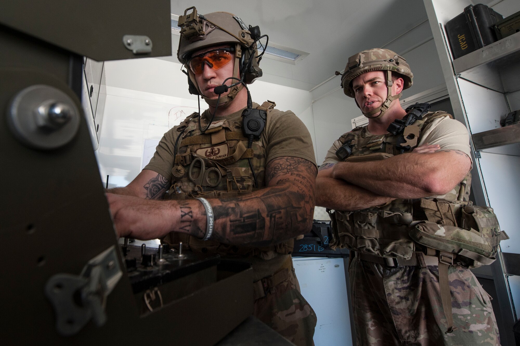 Staff Sgt. Cameron Duncan and Tech. Sgt. Michael Case, both of the 379th Expeditionary Civil Engineer Squadron explosive, ordnance, and disposal (EOD) team, navigate a remote F6A Robotic Platform through rocky terrain during a VBIED response training exercise Dec. 18, 2018, at Al Udeid Air Base, Qatar. Training participants utilized an F6A robotic platform, the bomb suit, and other specific tools to disrupt a VBIED during the exercise. (U.S. Air Force photo by Tech. Sgt. Christopher Hubenthal)