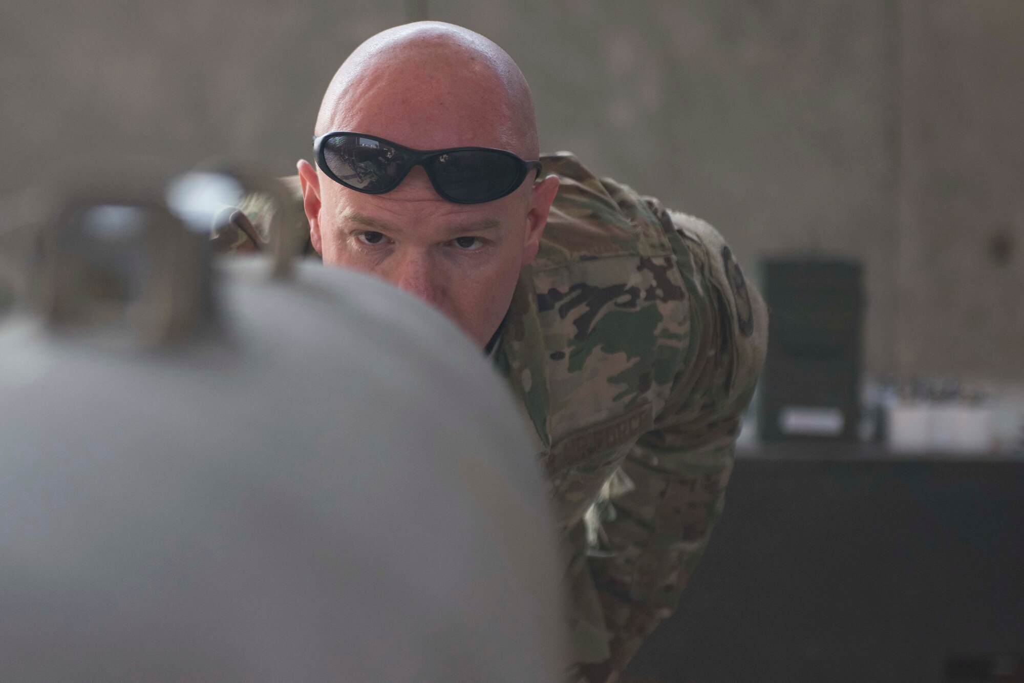 A bomb makes its way through hundreds of hands until it’s ready and fully functional. With each step as critical as the next, those working with explosives say it’s a hazardous yet gratifying experience.