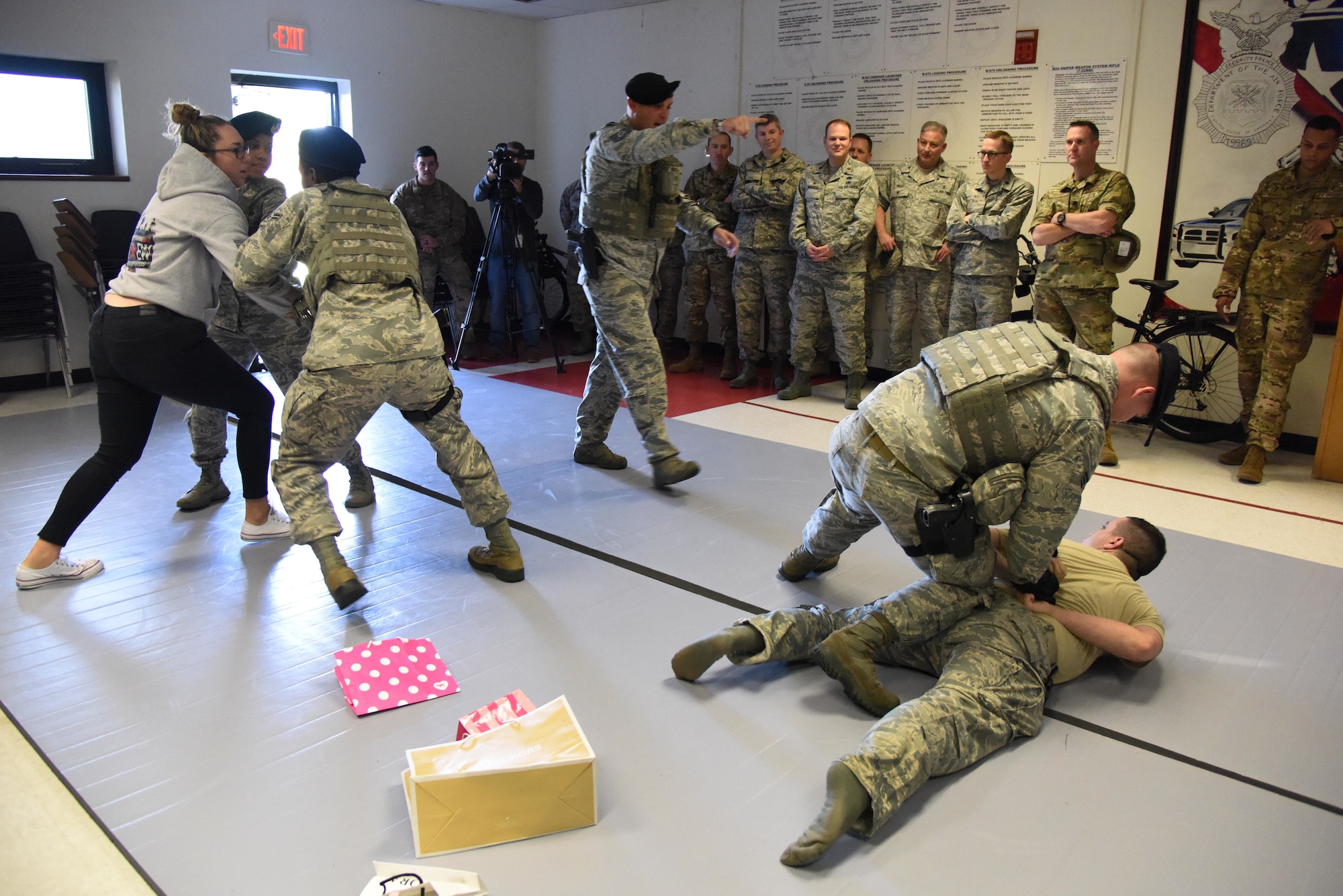 Members of the 81st Security Forces Squadron participate in a mock response to a domestic disturbance during the 81st SFS Day In The Life Of A Defender event at Keesler Air Force Base, Mississippi, Dec. 18, 2018. The event, which was the kick-off for the Year Of The Defender, allowed the 81st SFS to showcase their training and mission capabilities to Keesler leadership. (U.S. Air Force photo by Kemberly Groue)