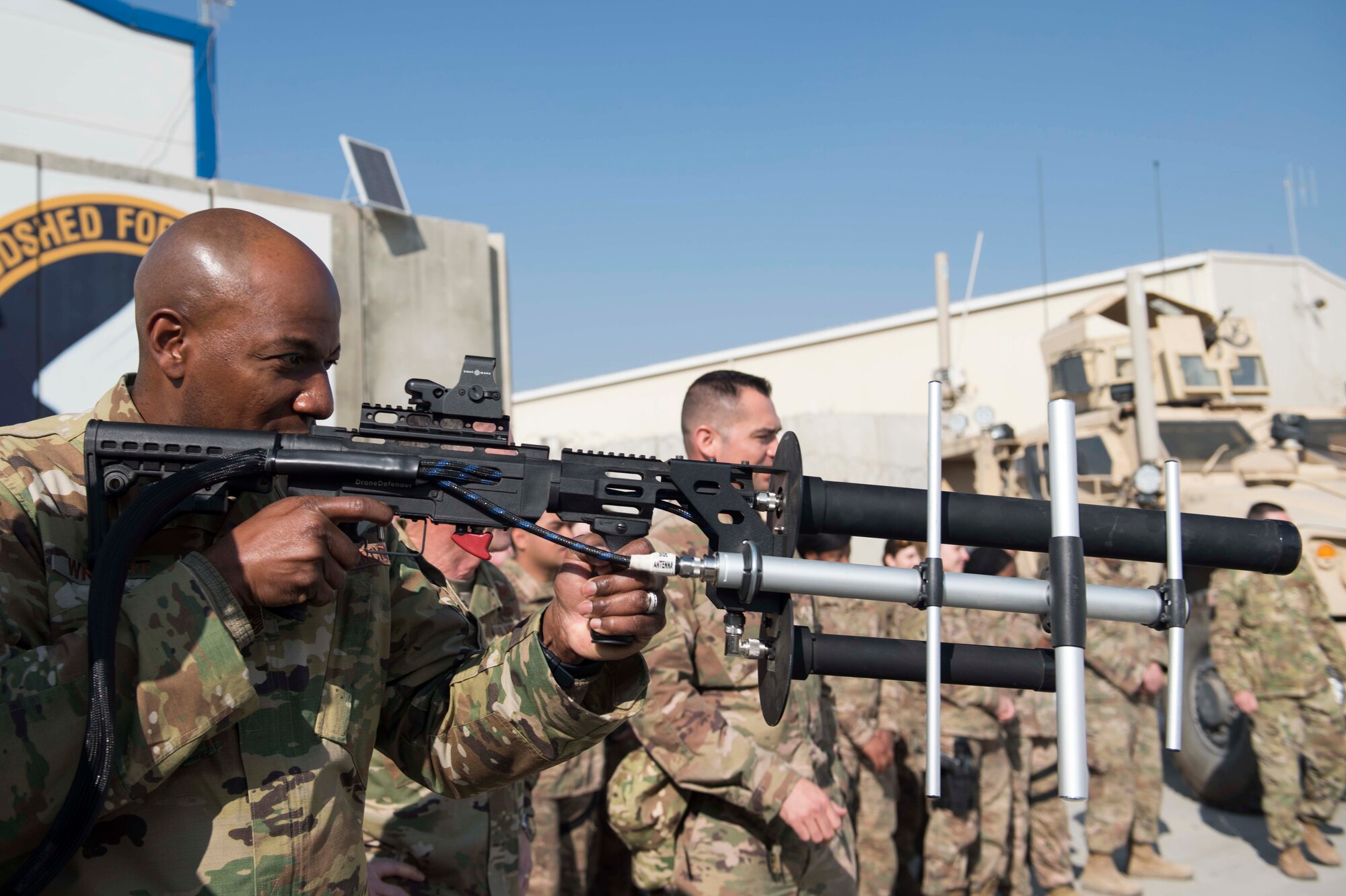 Chief Master Sgt. of the Air Force Kaleth O. Wright gets a hands-on demonstration of a counter-unmanned aircraft system known as a 'Drone Defender' during a visit with the 455th Expeditionary Security Forces Squadron at Bagram Airfield, Afghanistan, Dec. 25, 2018. Wright and Air Force Chief of Staff Gen. David L. Goldfein spoke about the “Year of the Defender” and some changes security forces Airmen will see during training exercises. (U.S. Air Force photo by Senior Airman Kaylee Dubois)