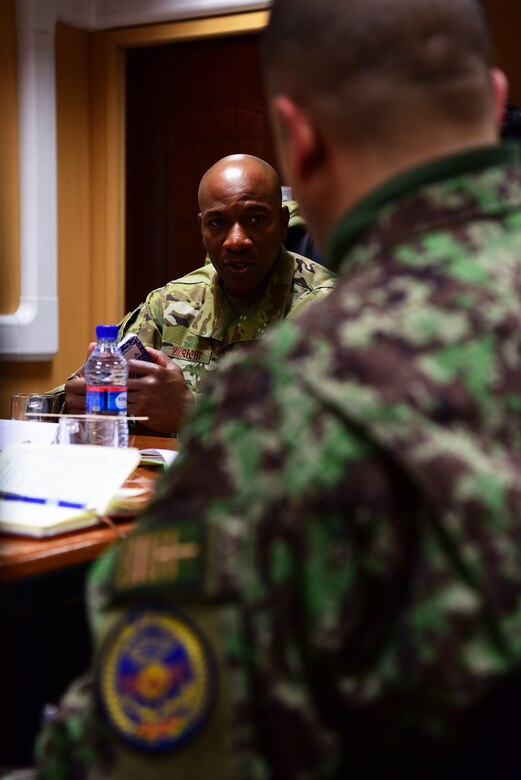Chief Master Sgt. of the Air Force Kaleth O. Wright speaks to Command Sergeant Major Amoo, senior enlisted leader of the Afghan Air Force, on Dec. 24, 2018. Wright traveled to Afghanistan with Air Force Chief of Staff Gen. David L. Goldfein to visit with Airmen during the holidays and engage with partner nation leaders. (U.S. Air Force photo by Staff Sgt. Ariel D. Partlow)