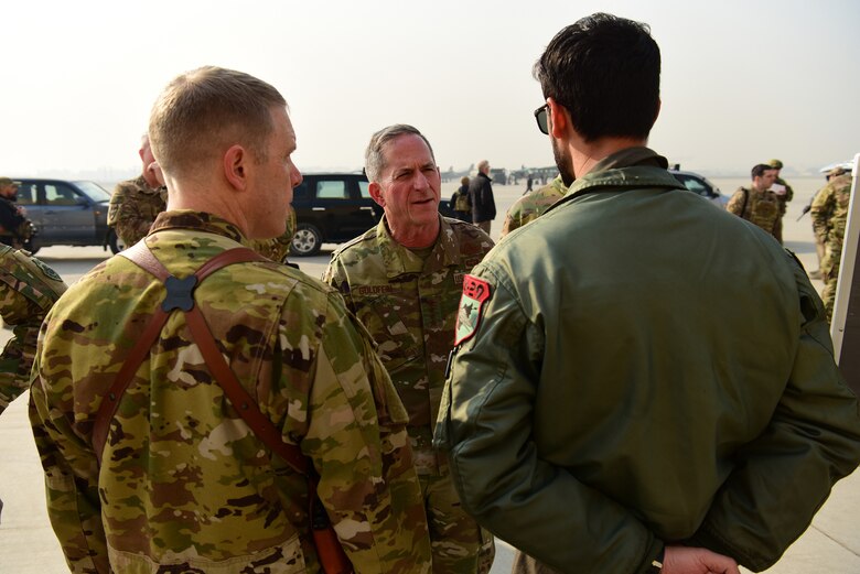 Air Force Chief of Staff Gen. David L. Goldfein speaks with Afghan Air Force and coalition A-29 Super Tucano pilots on the flightline in Kabul, Afghanistan, on Dec. 24, 2018. During the visit, Goldfein and Chief Master Sgt. of the Air Force Kaleth O. Wright met with advisors for each of the AAF's various airframes. (U.S. Air Force photo by Staff Sgt. Ariel D. Partlow)