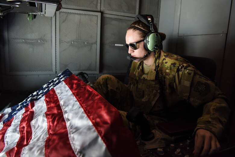 Senior Airman Neesen Bristow, 908th Expeditionary Refueling Squadron boom operator, prepares to deliver fuel during a sortie from Al Dhafra Air Base, United Arab Emirates, Dec. 19, 2018.