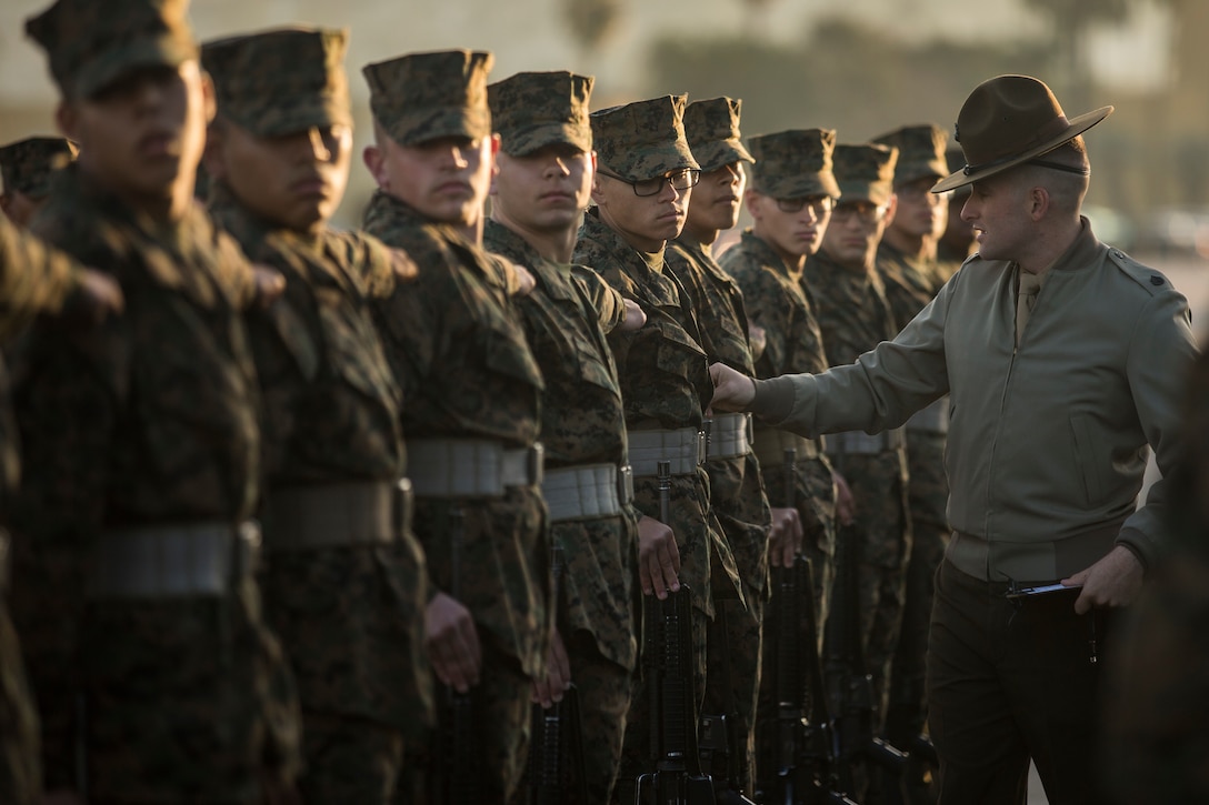 Recruits with Alpha Company, 1st Recruit Training Battalion, are getting evaluated during a final drill evaluation at Marine Corps Recruit Depot San Diego, Dec. 22. During evaluations, drillmasters score the platoons based on their uniforms, bearing, movements, as well as the drill instructor’s cadence and sword control. Annually, more than 17,000 males recruited from the Western Recruiting Region are trained at MCRD San Diego. Alpha Company is scheduled to graduate Feb. 1.