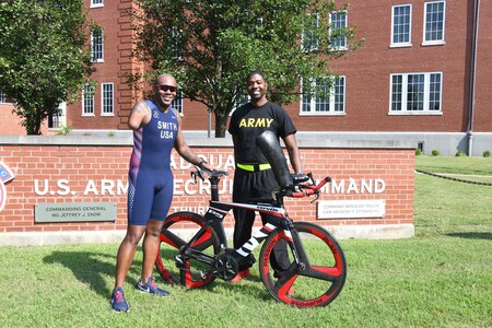 Sgt. 1st Class Jermond Awkward, U.S. Army recruiter and friend to Sgt. 1st Class Michael Smith, assisted Smith while training to become a Paralympic triathlete. Awkward said Smith is the most resilient man he knows.