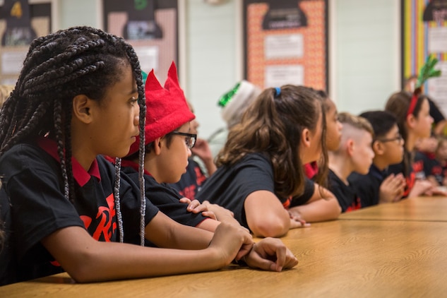Students at Bolden Elementary School listen to a school assembly during a D.A.R.E. graduation ceremony on Laurel
Bay, Dec. 17. The program was founded in 1983, and is now taught in more than 50 countries around the world,
according to the D.A.R.E. program website. The goal of the program is the educate students on the danger of substance
abuse.