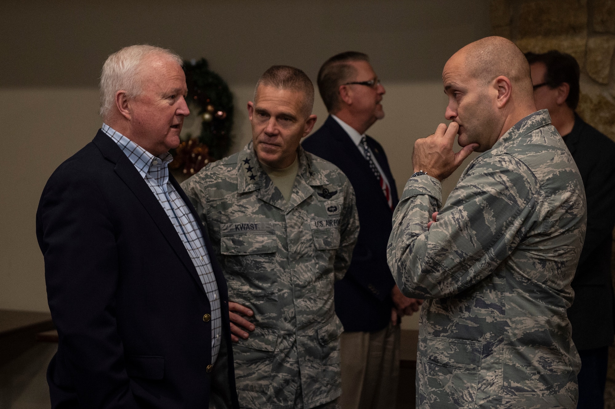 U.S. Air Force Lt. Gen. Steven Kwast, commander of Air Education and Training Command, speaks with Dr. Joe Leverett, Chief of Staff's Air Force Civic Leader Program and Altus Military Affairs Committee (MAC) chairman and Col. Eric Carney, 97th Air Mobility Wing commander, Dec. 18, 2018, at Altus Air Force Base, Okla. Members of the MAC, 97th AMW leadership and honorary commanders had lunch at Club Altus with Kwast to discuss the strong community partnership with the base. (U.S. Air Force photo by Senior Airman Cody Dowell)