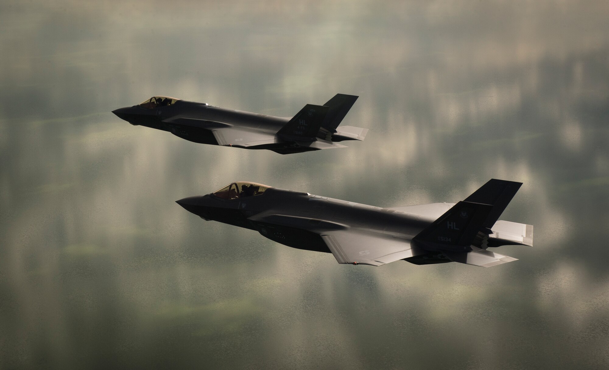 Two U.S. Air Force F-35A Lightning IIs, assigned to the 4th Fighter Squadron from Hill Air Force Base, Utah, conduct flight training operations over the Utah Test and Training Range on Feb 14, 2018. The F-35A is a single-seat, single engine, fifth generation, multirole fighter that’s able to perform ground attack, reconnaissance and air defense missions with stealth capability. (U.S. Air Force photo by Staff Sgt. Andrew Lee)