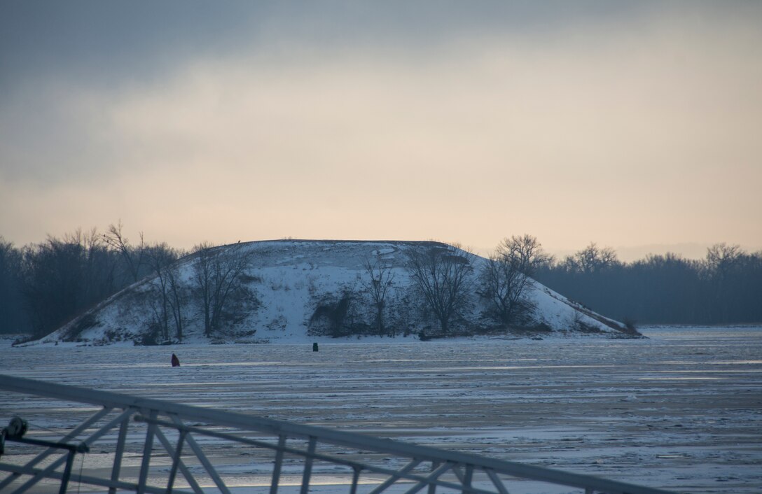 A dredged material placement site in the river