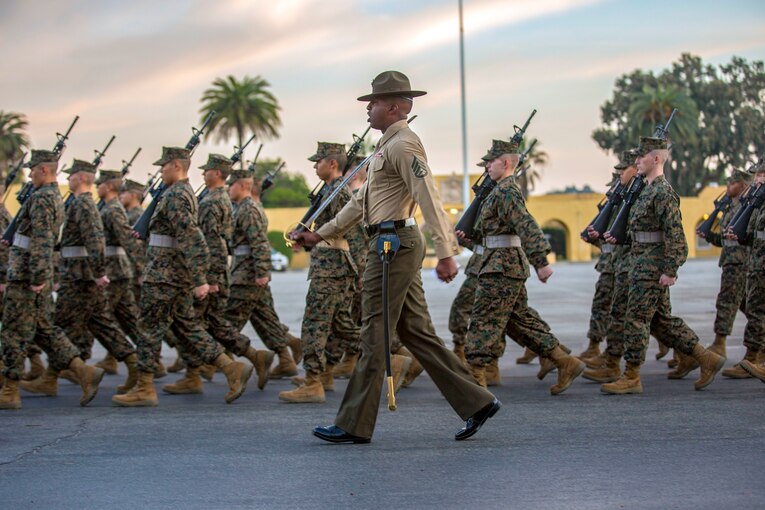 Marine Corps recruits march.