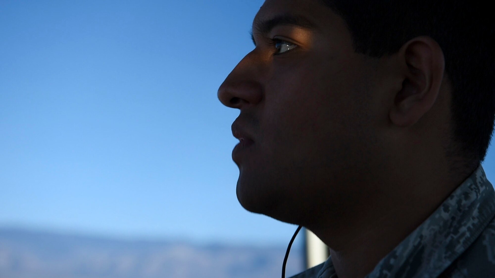 Senior Airman Ivan Montes, 54th Operations Support Squadron air traffic controller, gives a traffic call, Dec. 18, on Holloman Air Force Base, N.M. Holloman’s air traffic control tower supports between 50 and 60-thousand flying missions per calendar year. (U.S. Air Force photo by Staff Sgt. BreeAnn Sachs)