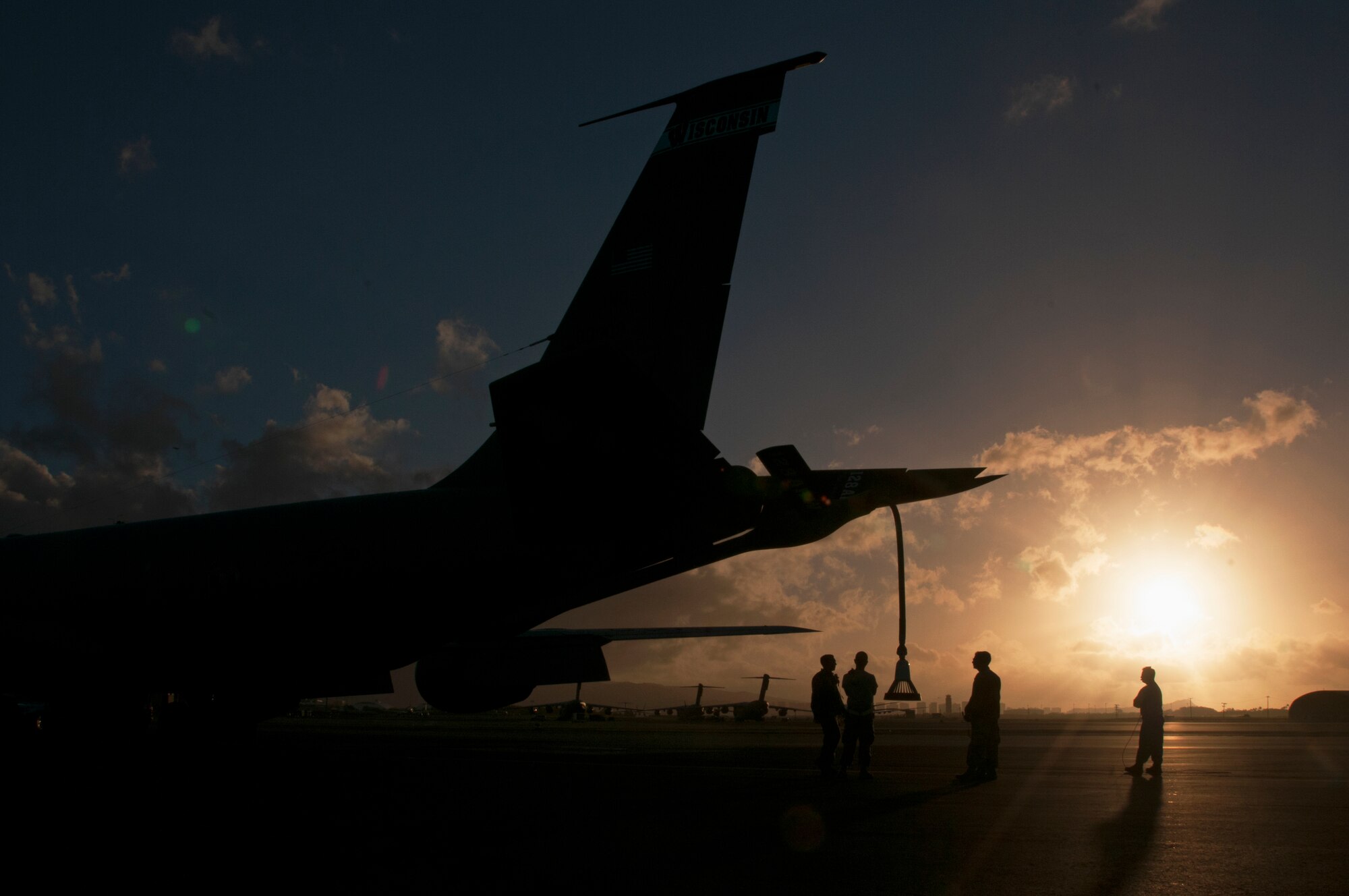 128th Air Refueling Squadron maintainers, conduct preflight maintenance on the Joint Base Pearl Harbor-Hickam flightline as part of a routine Sentry Aloha exercise, Dec. 12, 2018
