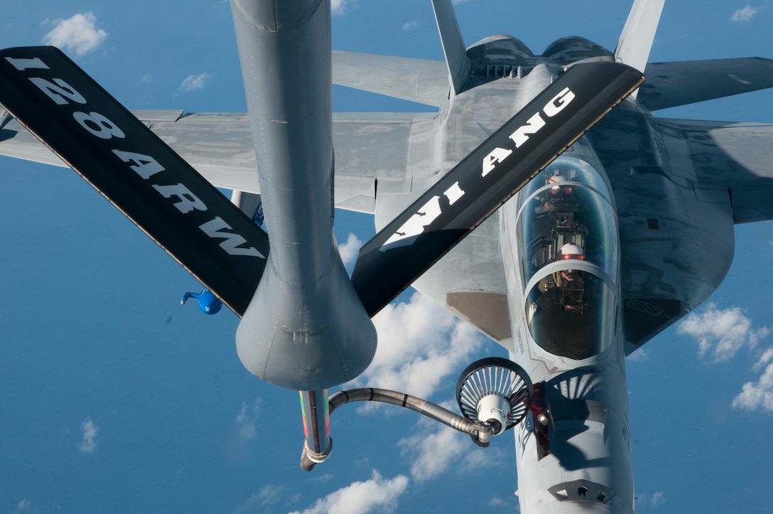 A U.S. Navy F/A-18 Hornet conducts air refueling operations Dec. 12, 2018, over the Pacific Ocean as part of a routine Sentry Aloha exercise.
