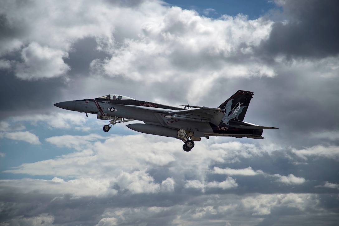 A U.S. Navy F/A-18F Super Hornet from China Lake, California, takes off from Joint Base Pearl Harbor-Hickam, Hawaii, during Sentry Aloha 19-1, Dec. 18, 2018