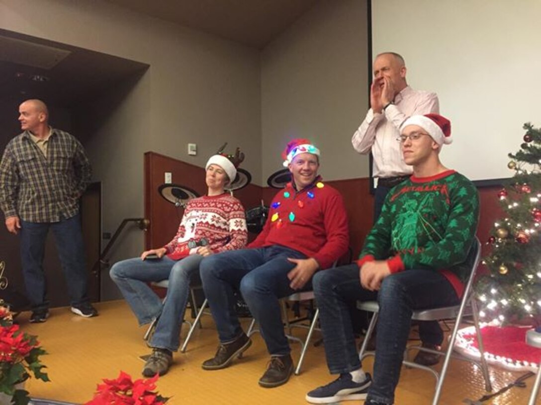 CAMP HUMPHREYS, Republic of Korea – Maj. Gen. Patrick J. Hermesmann, commander of U.S. Marine Corps Forces Korea, judges the “Ugly Sweater” Competition during the MARFORK Holiday Party here, Dec. 21.  Marines and families used the Pacific Victors Chapel for the holiday party to celebrate the command’s accomplishments, strengthen relationships within the command, and share their common fellowship with each other.