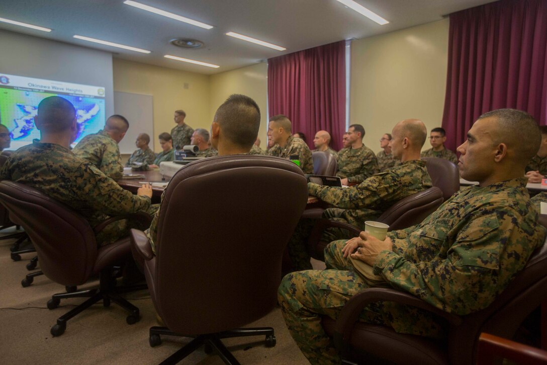 Col. Robert Brodie, commanding officer of the 31st Marine Expeditionary Unit, and Sgt. Maj. Edwin Mota, 31st MEU sergeant major, listen in on a confirmation brief during MEU Exercise at Camp Hansen, Okinawa, Japan, Dec. 12, 2018. The 31st MEU, the Marine Corps’ only continuously forward-deployed MEU, provides a flexible force ready to perform a wide range of military operations as the premier crisis response force in the Indo-Pacific Region. (U.S. Marine Crops photo by Lance Cpl. Cameron Parks)