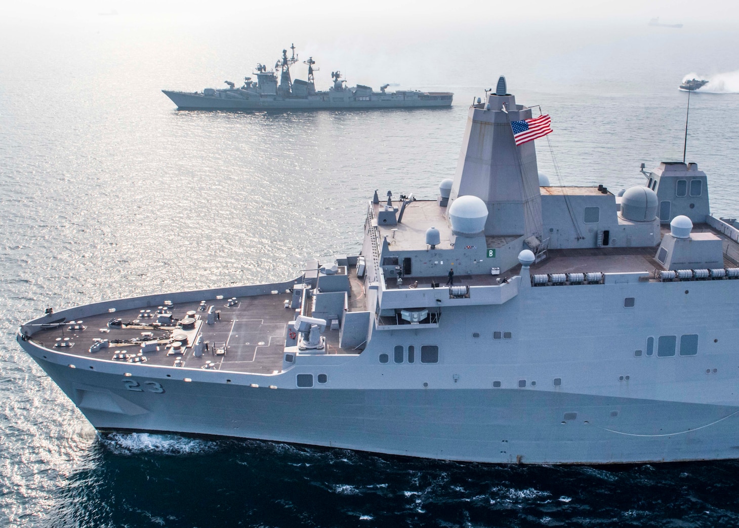 INDIAN OCEAN (Dec. 26, 2018) The San Antonio-class amphibious transport dock ship USS Anchorage (LPD 23), bottom, transits Bay of Bengal alongside Indian navy destroyer INS Rajput (D 51) while conducting a cooperative deployment with the Indian navy. Anchorage is deployed as part of the Essex Amphibious Ready Group (ARG) and 13th Marine Expeditionary Unit (MEU).