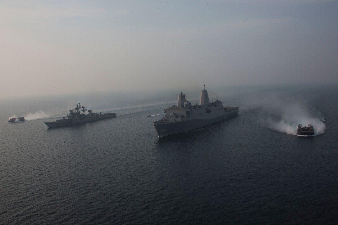 The San Antonio-class amphibious transport dock USS Anchorage, and embarked 13th MEU participate in a cooperative deployment with the Indian vessel, INS Rajput, to test their ability to communicate and improve on maritime capabilities between partners, Dec. 26, 2018. The Anchorage is deployed as part of the Essex ARG Amphibious Ready Group. The Essex ARG and 13th MEU are a capable and lethal Navy-Marine Corps team deployed to the U.S. 7th Fleet area of operations to support regional stability, reassure partners and allies and maintain a presence postured to respond to any crisis ranging from humanitarian assistance to contingency operations.