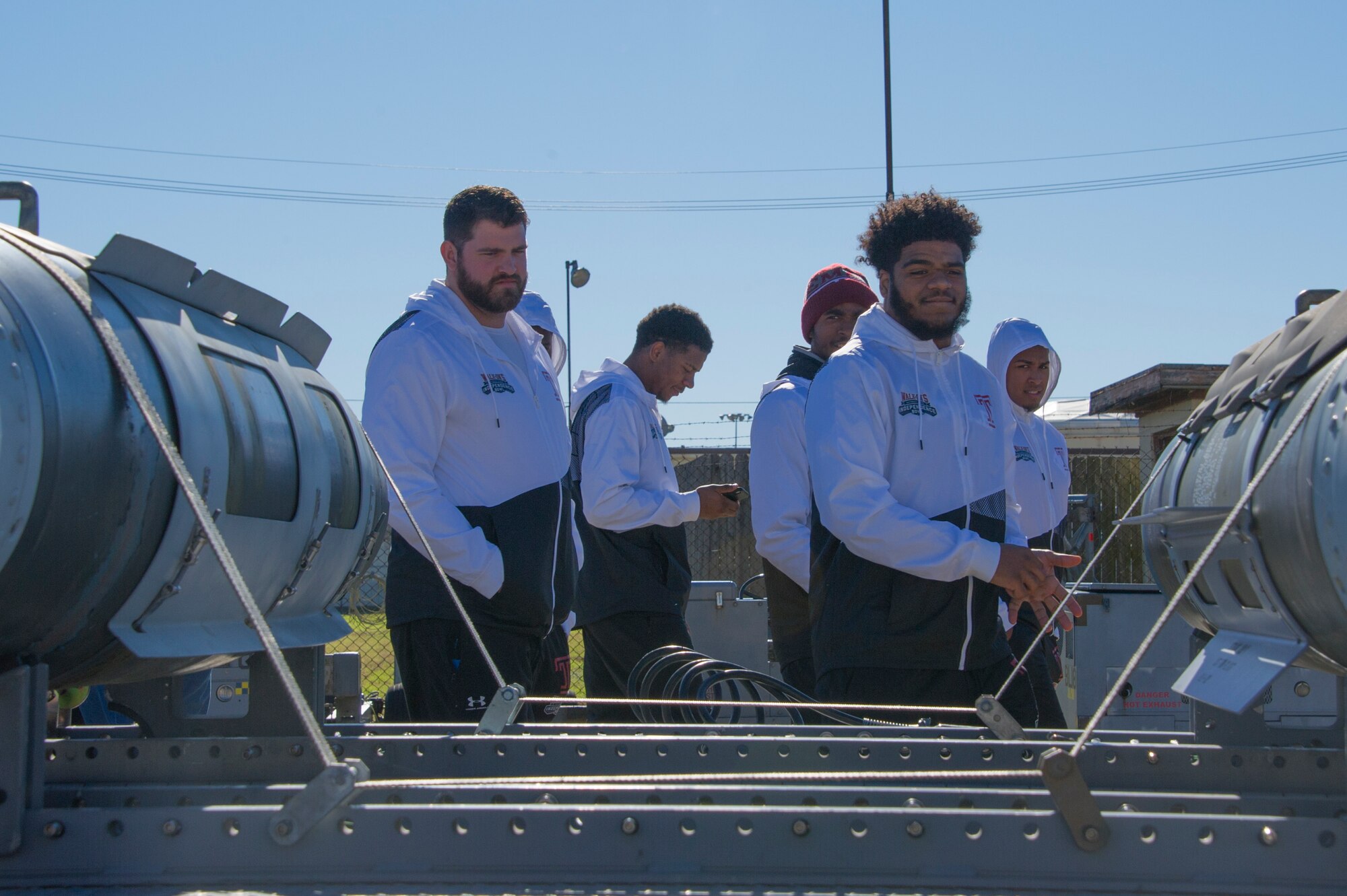 Temple University football players tour a display of munitions used by the B-52 Stratofortress during their visit to Barksdale Air Force Base, Louisiana, December 24, 2018. The team was given a tour of a B-52 in addition to the munitions exhibit during their visit to Barksdale before playing Duke University in the 2018 Walk On’s Independence Bowl.(U.S. Air Force photo by Airman 1st Class Maxwell Daigle)