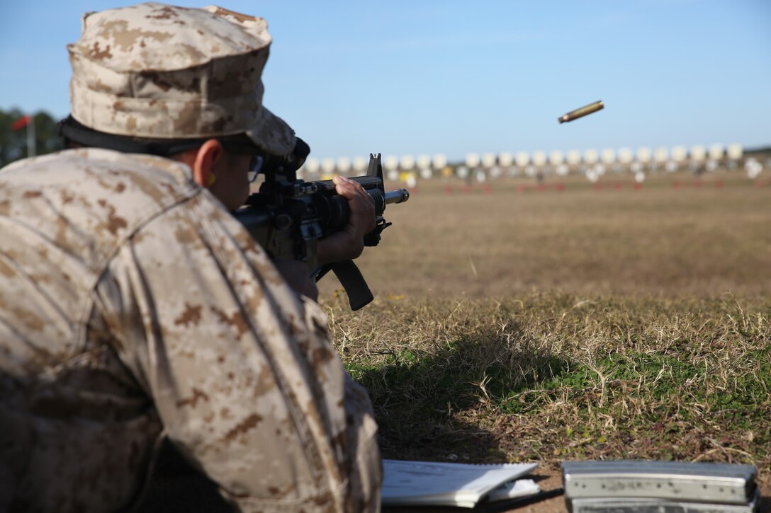 A recruit with Delta Company, 1st Recruit Training Battalion, fires his M16-A4 service rifle on Marine Corps Recruit Depot Parris Island, S.C, Dec. 26, 2018. Qualifying with the M16-A4 service rifle teaches recruits to understand the weapon system in order to keep with the concept "Every Marine a Rifleman." (U.S. Marine Corps photo by Lance Cpl. Shane T. Manson/Released)