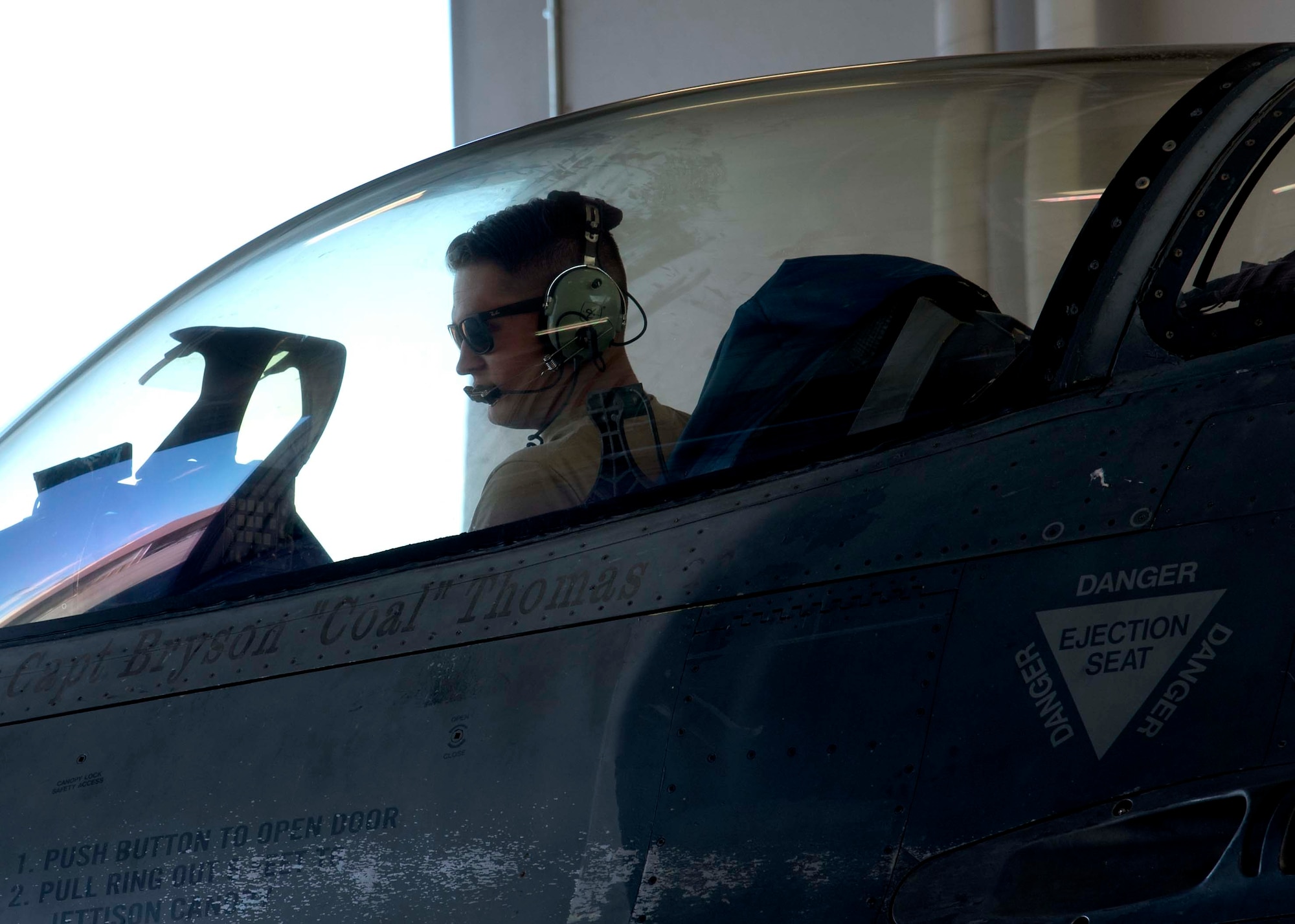 Tech. Sgt. Brandon Brittain, 311th Aircraft Maintenance Unit Dedicated Crew Chief, performs operational checks on an F-16 Fighting Falcon Oct. 4 on Holloman Air Force Base, N.M. As a pilot training base, Holloman crew chiefs impact the Air Force mission in an essential way, keeping the aircraft flight-ready at all times to avoid delays in training. (U.S. Air Force photo by Airman 1st Class Kindra Stewart)