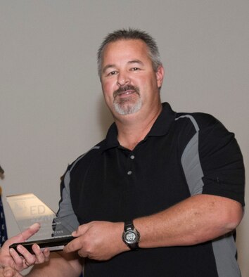 Greg Myers, 412th Range Squadron, receives his Innovator of the Quarter Award in Nov. 2017. (U.S. Air Force photo by Kyle Larson)